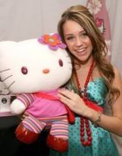 miley with her toy:))HELLOKYTTYQUEEN