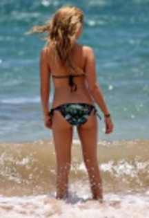 ashley_tisdale_hawaiian_bikini_candid_july_3_2008e_r4ALVw1_thumb - The beach