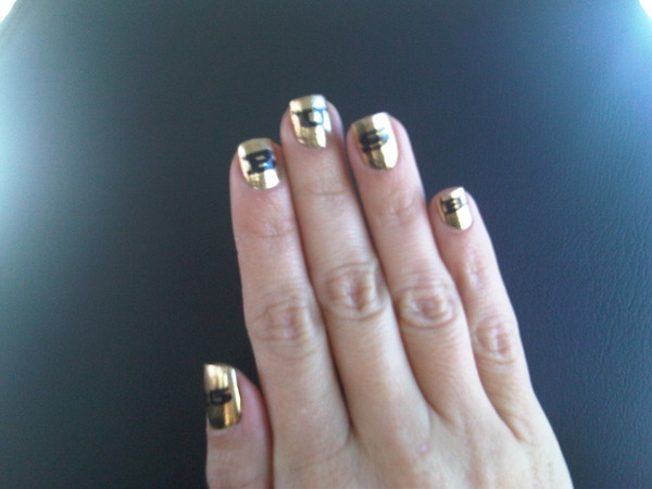 Check out my gold Minx nails! They spell BUSH w a #25 on my thumbs! - Chic