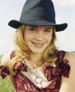 12 - Emma with hats