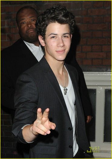 nick-jonas-lucie-stage-door-01 - Nick-out at queens theatre London