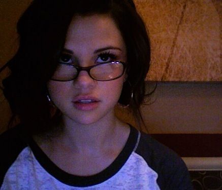 sel with glasses