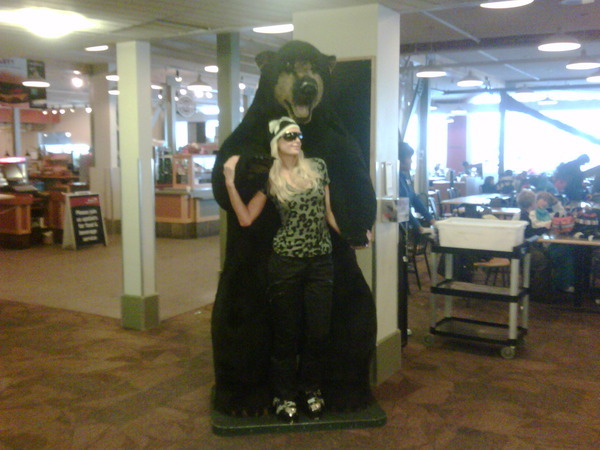 Posing with a Huge Bear - Don't worry he's not real. I hate when people kill and stuff animals, so m - big bear hug