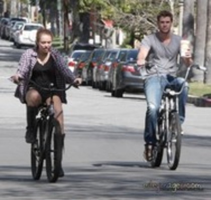 26264020_HRQFZFNJH - x Riding Her Bike in Toluca Lake