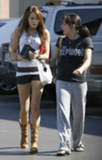 17469552_WDMMQMGLV - miley cyrus and mandy jiroux Leaving Blockbuster in Hollywood March 10 2008