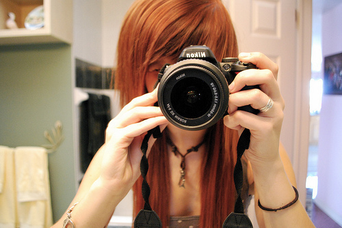 camera-girl-hair-red-head-Favim.com-130897