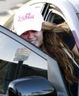 15536338_YTMKCAFCS - Miley Cyrus And Justin Gaston Leaving Mo s Restaurant