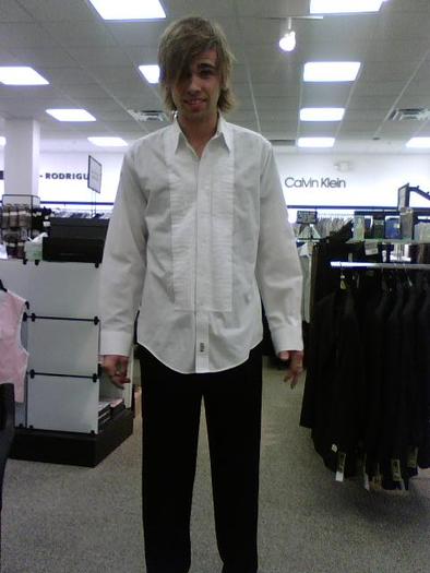 Sam's getting fitted for a tux for Dusty's wedding. Haha!!