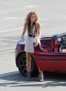 17025882_ALHCNASNP - Miley Cyrus Photoshoot in a Tesla Roadster