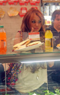 15295311_UHQTCTJXK - Miley Cyrus at Cafe Metro