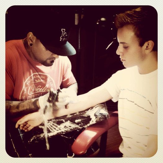 Ryan miss u.There its him getting his 1st tattoo.lol