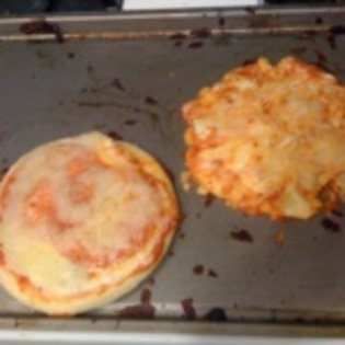 My brother and I made pizza In related news I fail. Guess which is mine