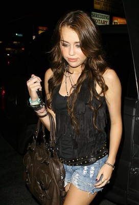 miley-cyrus-703704l-poza