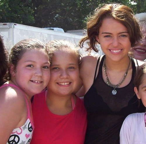 Miles with some fans at the set for " The Last Song " - x Miley with her fans x