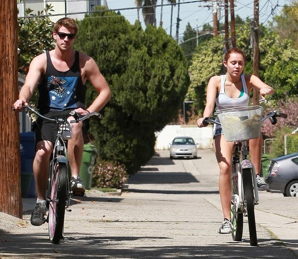Miley+Cyrus+Liam+Hemsworth+Riding+Their+Bikes+2EJ5UIjt0iUl - Riding their bikes