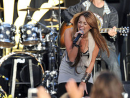 15290179_VQVOBKDTE - Miley Cyrus Performs At Make-A-Wish Foundations World Wish Day