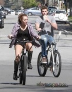 26264023_IUGWKZYYN - x Riding Her Bike in Toluca Lake