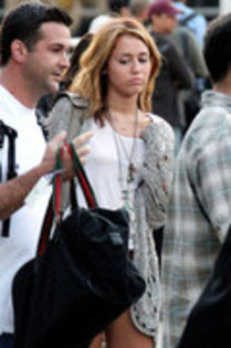 16934308_XOXNQGBFF - Miley Cyrus looking a bit exhausted as she arrives from Nashville at LAX