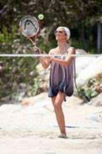  - Playing tennis
