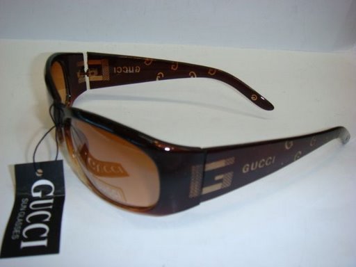 28006(1) - Gucci sun