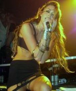 17047554_TRXZAILRN - Miley Cyrus Performs at G-A-Y Club
