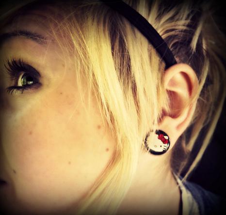 ; I bought these amazing Hello kitty plugs when I was in Sweden!

My plugs are 12mm :3 I know I've said this a million times, but

this is my final size. When my ears were pierced they

were very uneven
