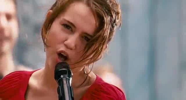 miley ray cyrus (1) - miley cyrus in hannah montana the movie singing the climb