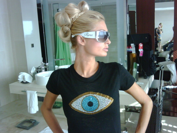 Rocking my Paris Hilton Sunglass Line. Huge - Wearing the Evil Eye to ward off evil