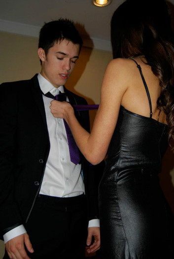 Trying to remember how to tie his tie from St. John`s days, haha