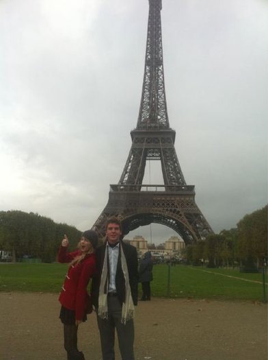 Eiffel Tower. Hanging out with my brother. Thumbs up.