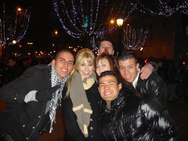 New Year\'s Eve on the Champs-Elysees. 20,000 people and we have no idea who these guys are that jum