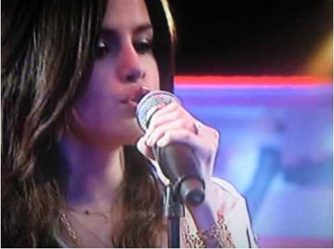 singing - Selena Gomez