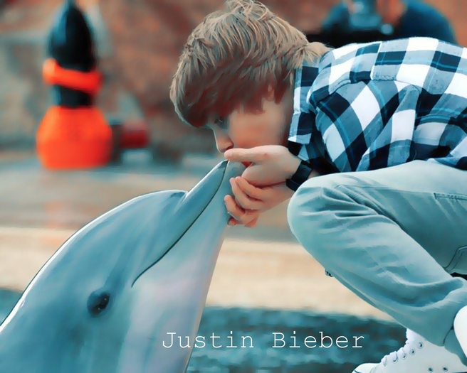 justin-justin-bieber-12747588-1500-1200 - Justin Bieber in water with dolphin