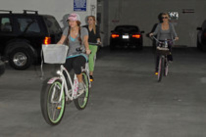 15823766_ASCGZEJML - Miley Cyrus on a Bicycle