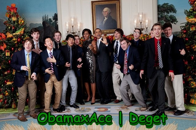 President Barack Obama and First Lady Michelle Obama pretend to sing with an a cappella group in the