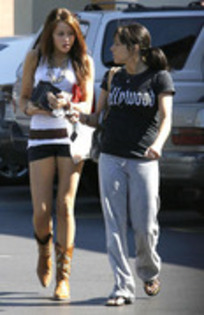 17469553_XKKOFITTD - miley cyrus and mandy jiroux Leaving Blockbuster in Hollywood March 10 2008