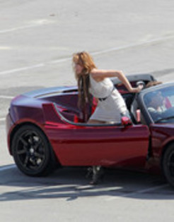 17025893_FVEVMAGOX - Miley Cyrus Photoshoot in a Tesla Roadster
