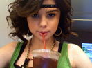 SelenaDrinkingIcedTea