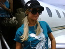 Getting off the jet in Rio wearing a shirt from my new line