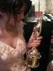 I think I'll sleep with my dress on and award in my hand tonight. I kind of don't want to forget thi