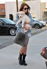 Miley+Cyrus+holds+fluffy+white+puppy+while+VSq8LA0A5Jbl