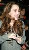 miley-cyrus_dot_com-leavingregisandkelly-nyc2006oct24-003