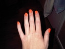 Painted my nails bright orange gotta look fresh when I go to the UK