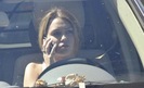 miley-cyrus-talking-phone-driving-061