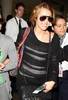 Miley-Cyrus_COM_LAXAirport_8Sept2010_01