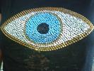 Wearing the Evil Eye to ward off evil